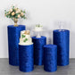Royal blue crushed velvet pedestal stand covers for decorative displays.