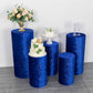 Royal blue crushed velvet pedestal stand covers in a decorative display.