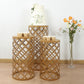 Gold metal cylinder pillar cake display stands in hollow overlapping circles pattern.