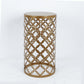 Gold metal cylinder cake display stand with hollow overlapping circles pattern.