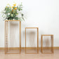 Gold metal rectangular plant stands with geometric pattern, ideal for floral displays.