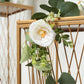 Gold geometric plant stands with floral decor, perfect for cake or floral displays.
