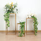 Gold metal rectangular plant stands with geometric design, perfect for floral displays.