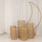Natural woven rattan wicker pedestal stands in various heights.