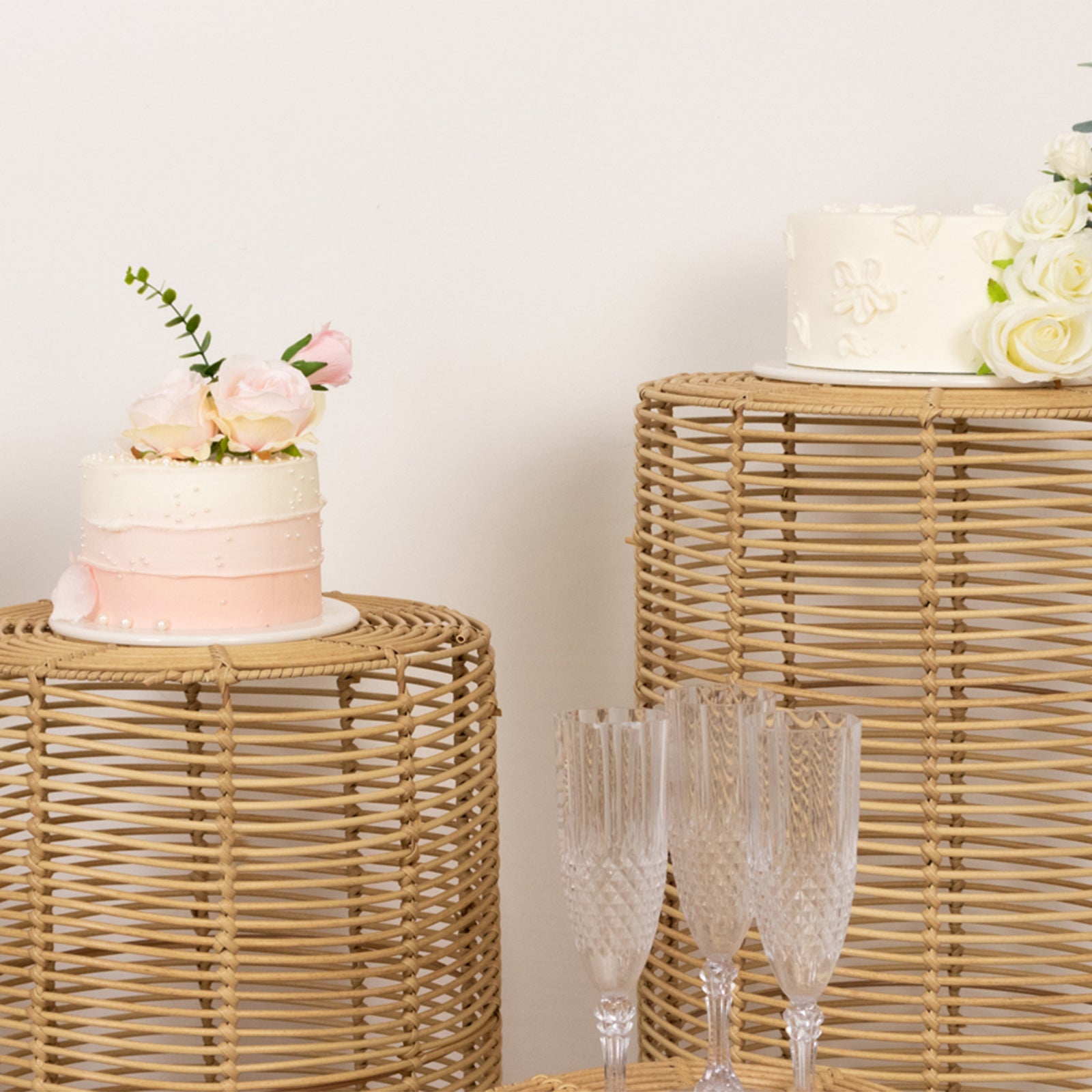 Natural woven rattan pedestal stands for cake and plant display, Boho chic style.