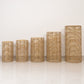Natural woven rattan wicker pedestal stands in various heights.