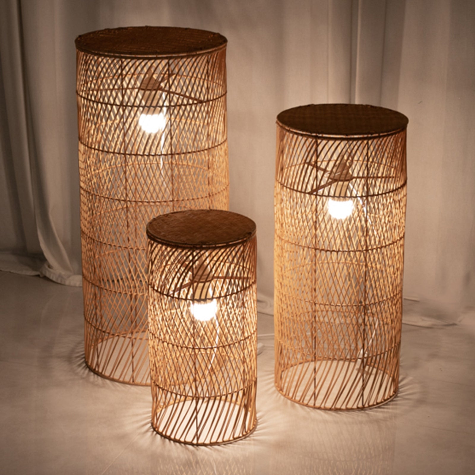 Natural woven rattan wicker pedestal lamp shades in rustic farmhouse style.