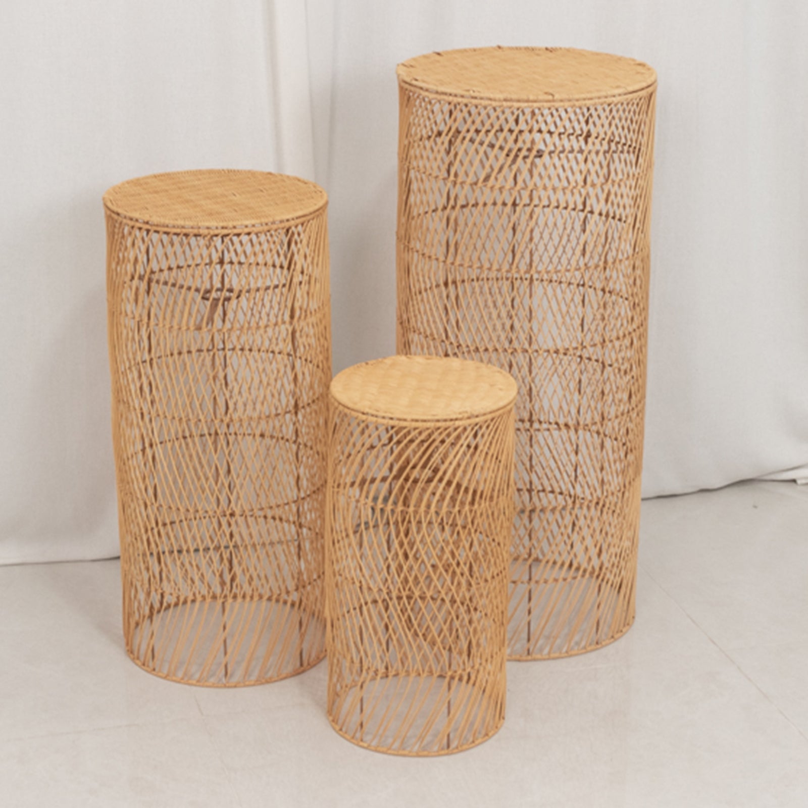 Natural woven rattan wicker pedestal stand lamp shades in rustic farmhouse style.