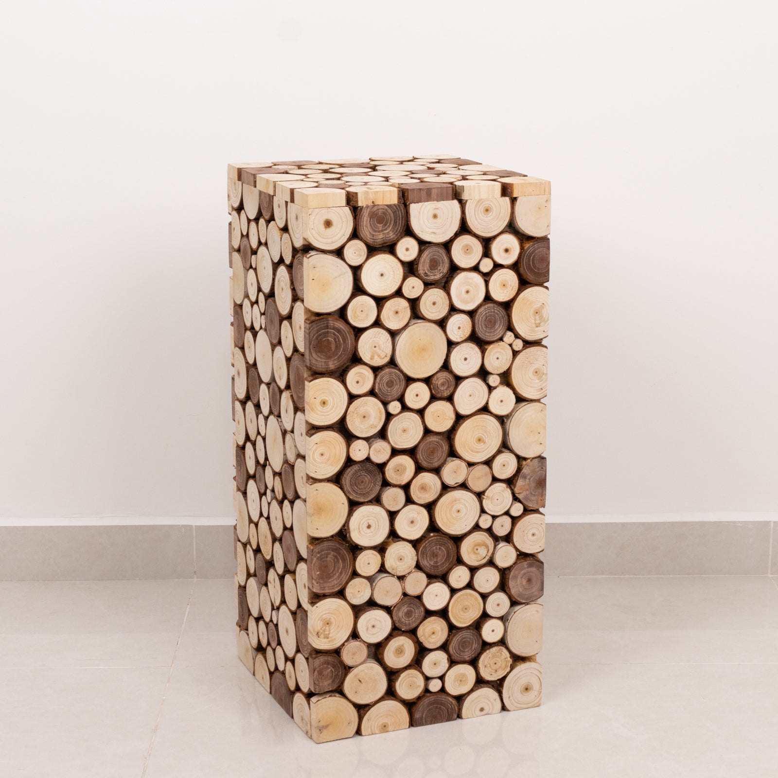 Natural wooden slices pillar stand, rustic farmhouse style.