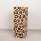 Natural wooden slices pedestal stand for rustic farmhouse decor.
