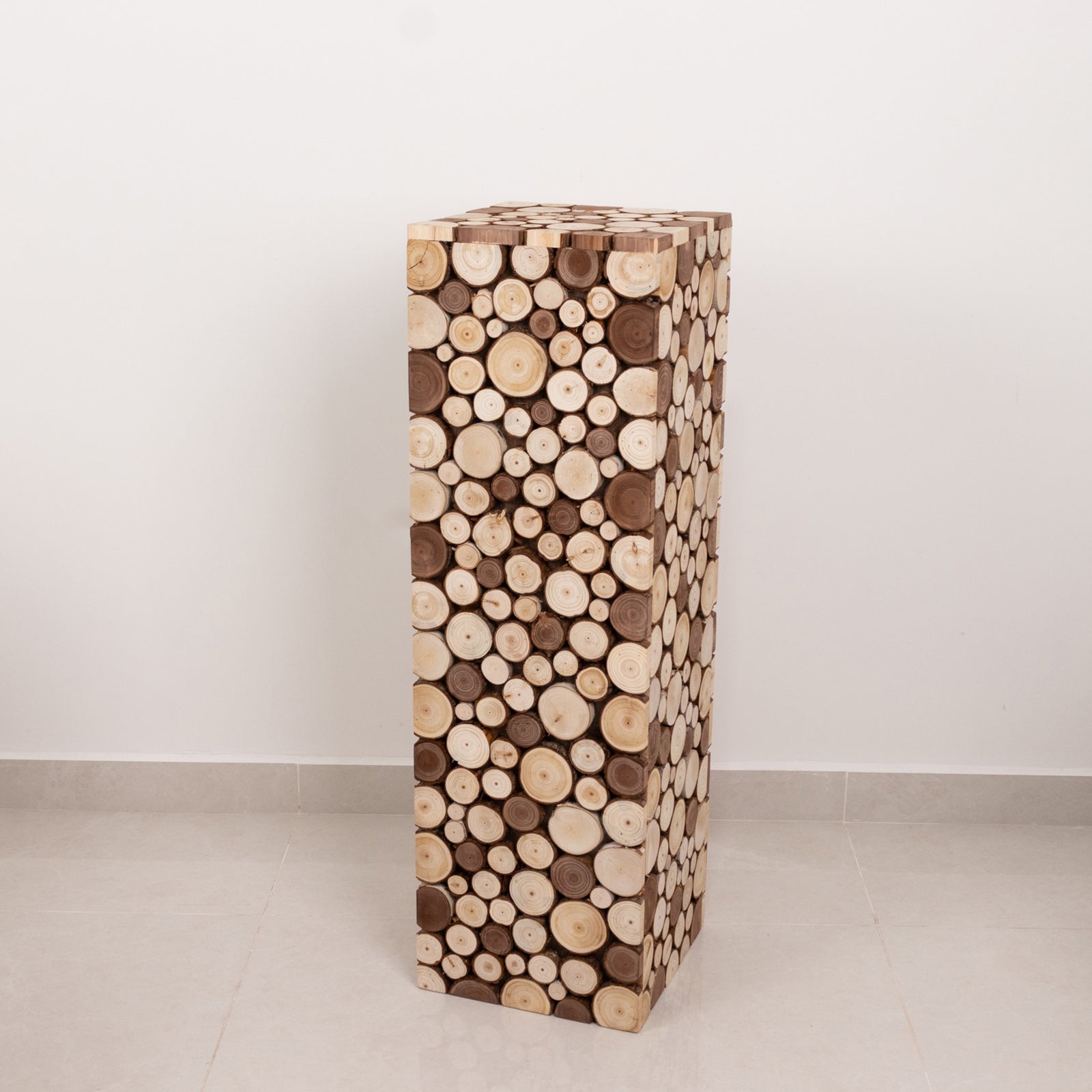 Natural wooden pillar stand in rustic farmhouse style.