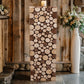 Natural wooden slices pedestal stand for rustic decor.