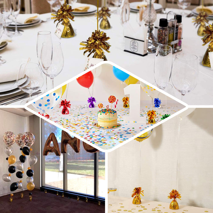 Metallic silver foil tassel top party balloon weights on a festive table.