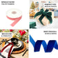 Red velvet ribbon spool for DIY crafts and decorations.
