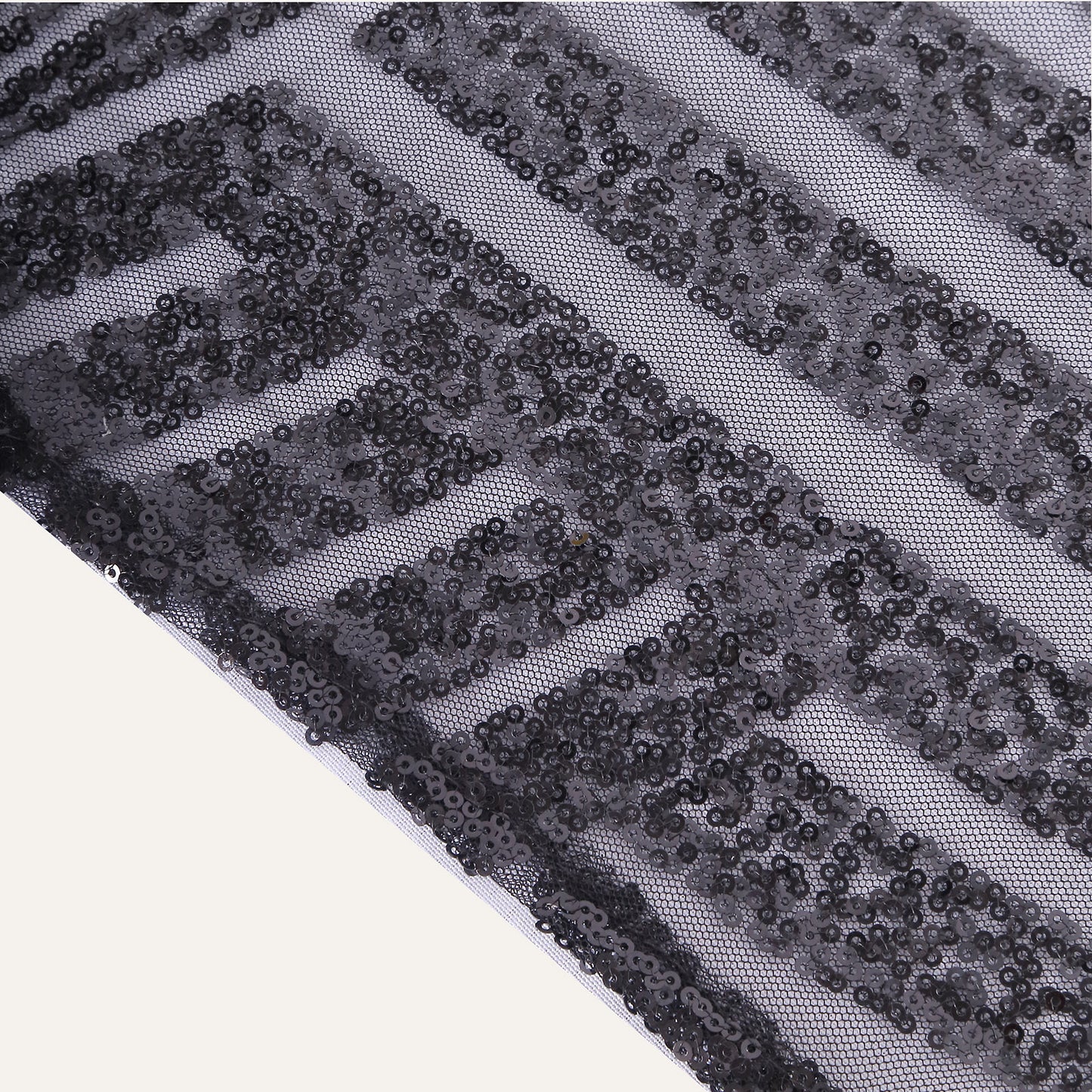 Black sequin table runner with diamond glitz design.
