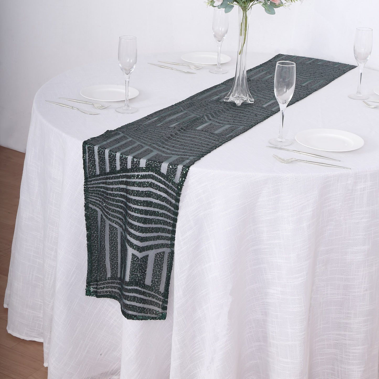 Hunter Emerald Green Sequin Table Runner on a white table.