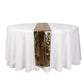 Shiny black gold foil table runner on a white tablecloth.