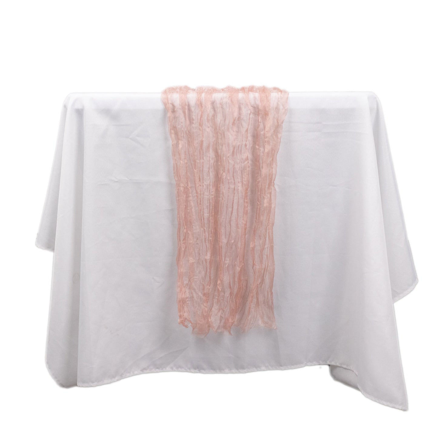 9ft Dusty Rose Sheer Crinkled Organza Table Runner on a white tablecloth