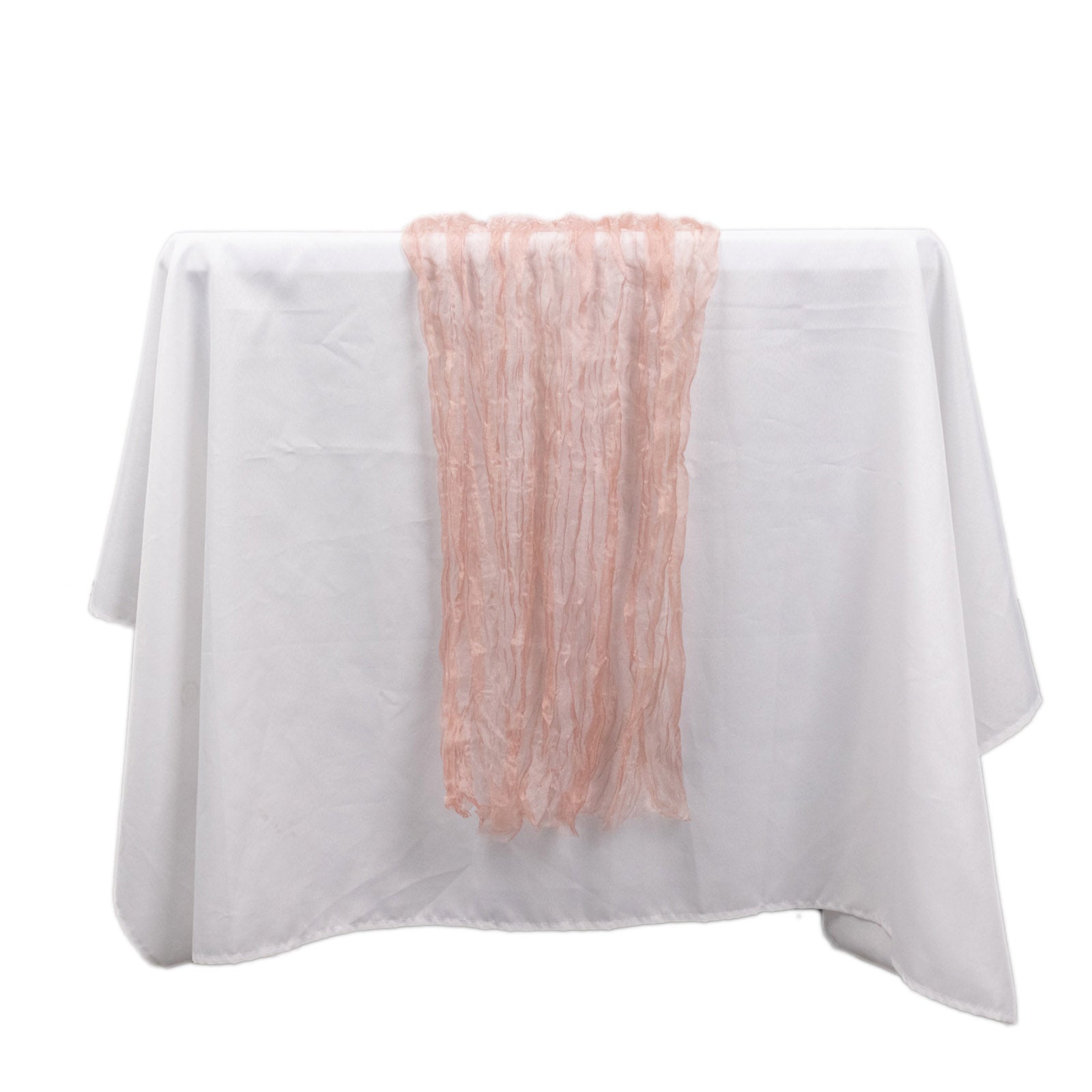 9ft Dusty Rose Sheer Crinkled Organza Table Runner on a white tablecloth