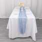 9ft Dusty Blue Sheer Crinkled Organza Table Runner on a white table.