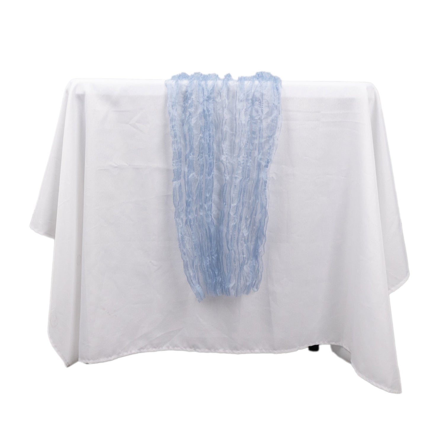 9ft Dusty Blue Sheer Crinkled Organza Table Runner on a white table.