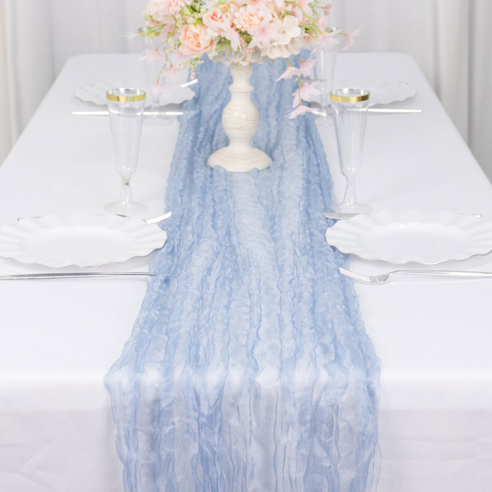 9ft Dusty Blue Sheer Crinkled Organza Table Runner on a white table setting.