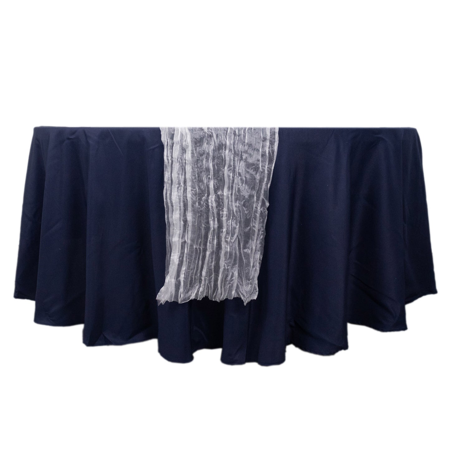 9ft white sheer crinkled organza table runner on a navy blue table.
