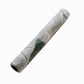 White table runner with green monstera palm leaves print, stylish for spring and summer.