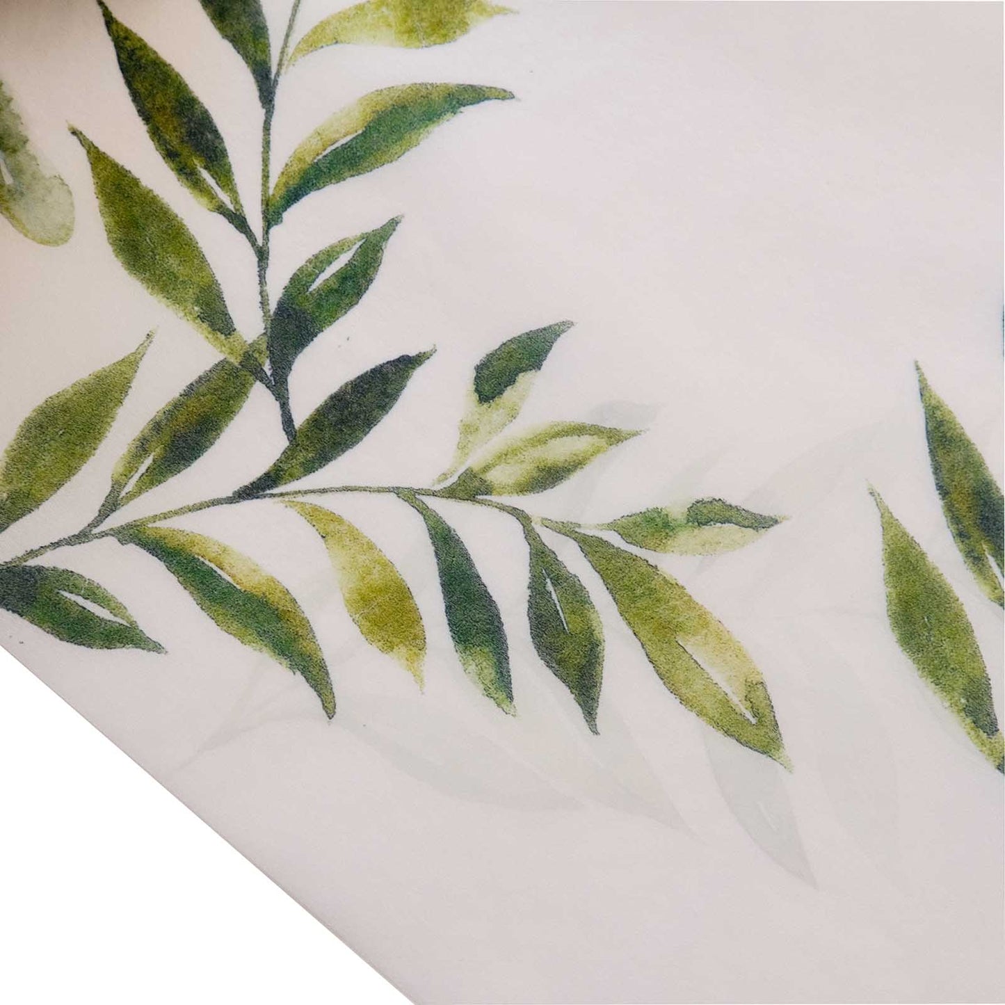 White table runner with green olive leaves print for spring summer dining decor.
