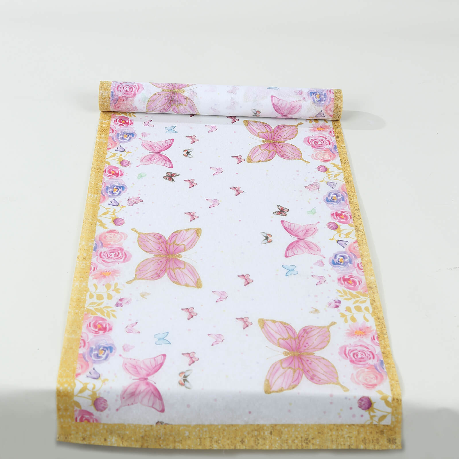 White table runner with pink butterflies for spring summer dining decor.