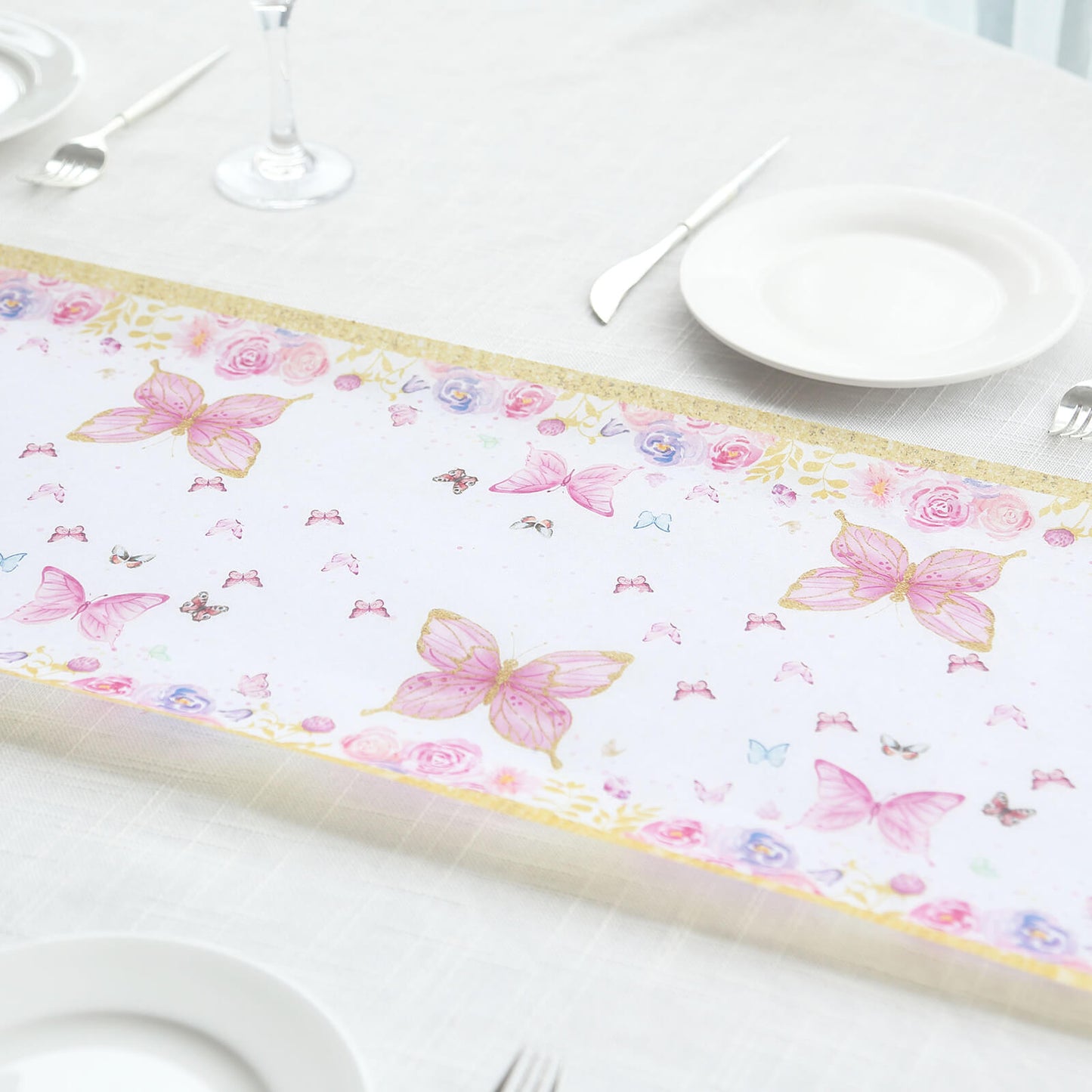 White table runner with pink butterflies, perfect for spring and summer dining decor.