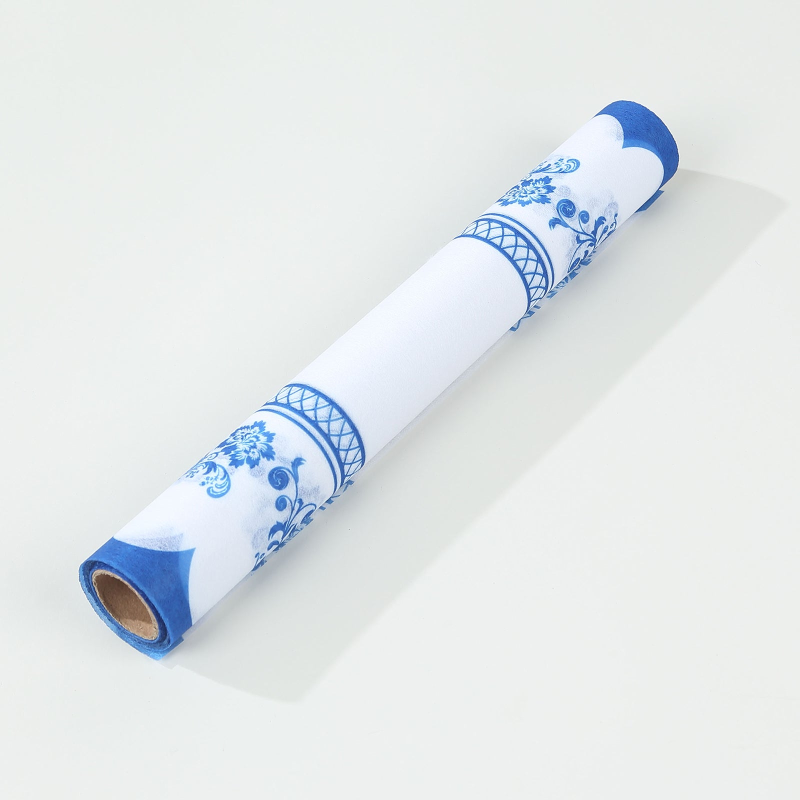 White table runner with blue ornate floral prints, stylish kitchen decor.