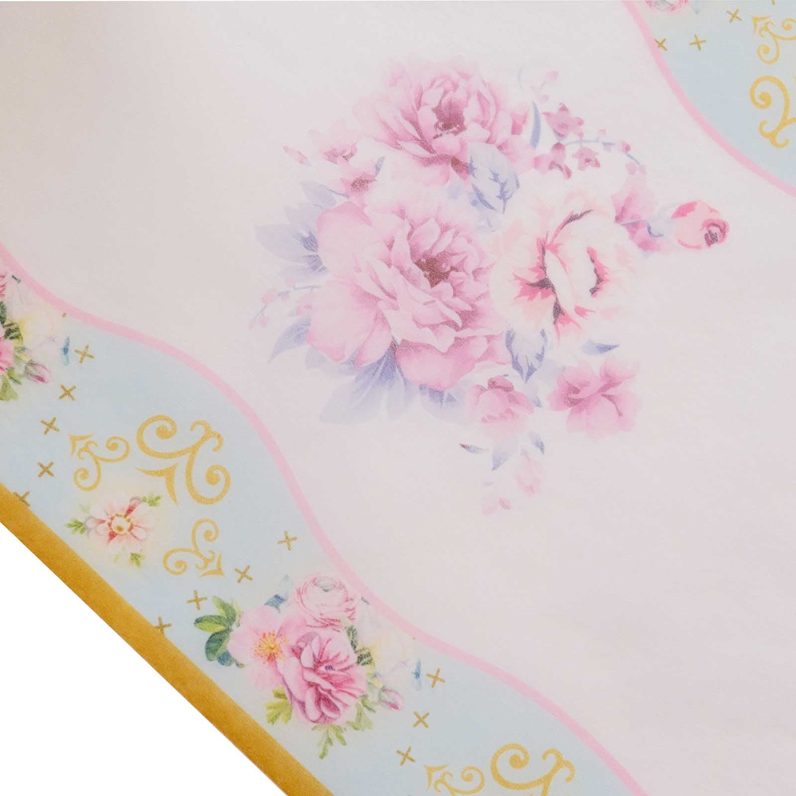 White table runner with pink peony floral print for spring and summer dining decor.