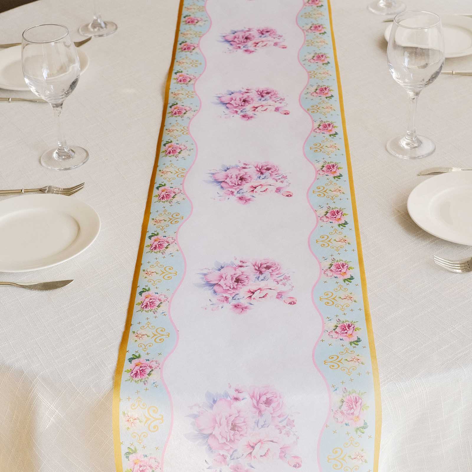 White disposable table runner with pink peony floral print for spring dining.
