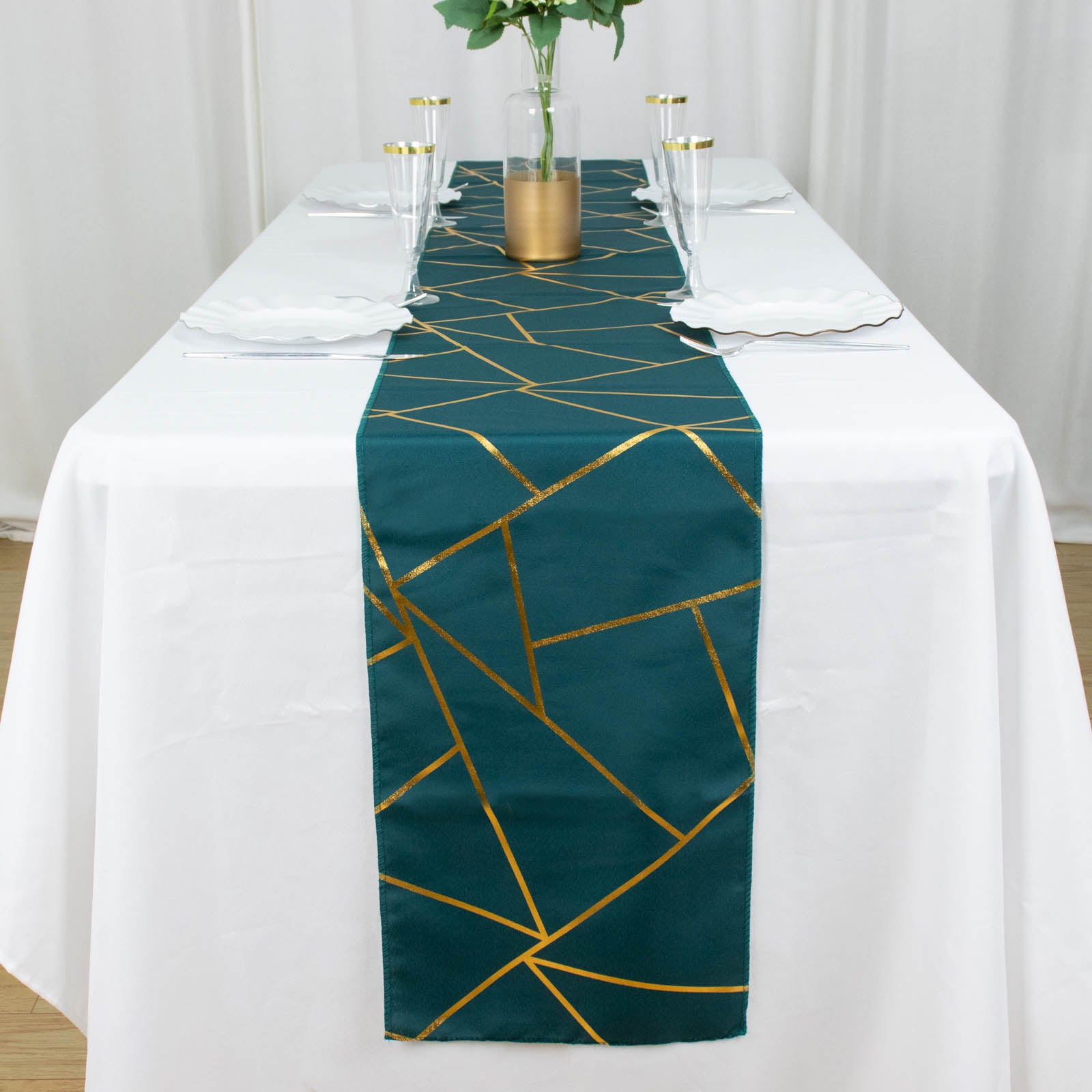 Peacock teal table runner with gold foil geometric pattern.