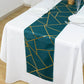 Peacock teal table runner with gold foil geometric pattern.