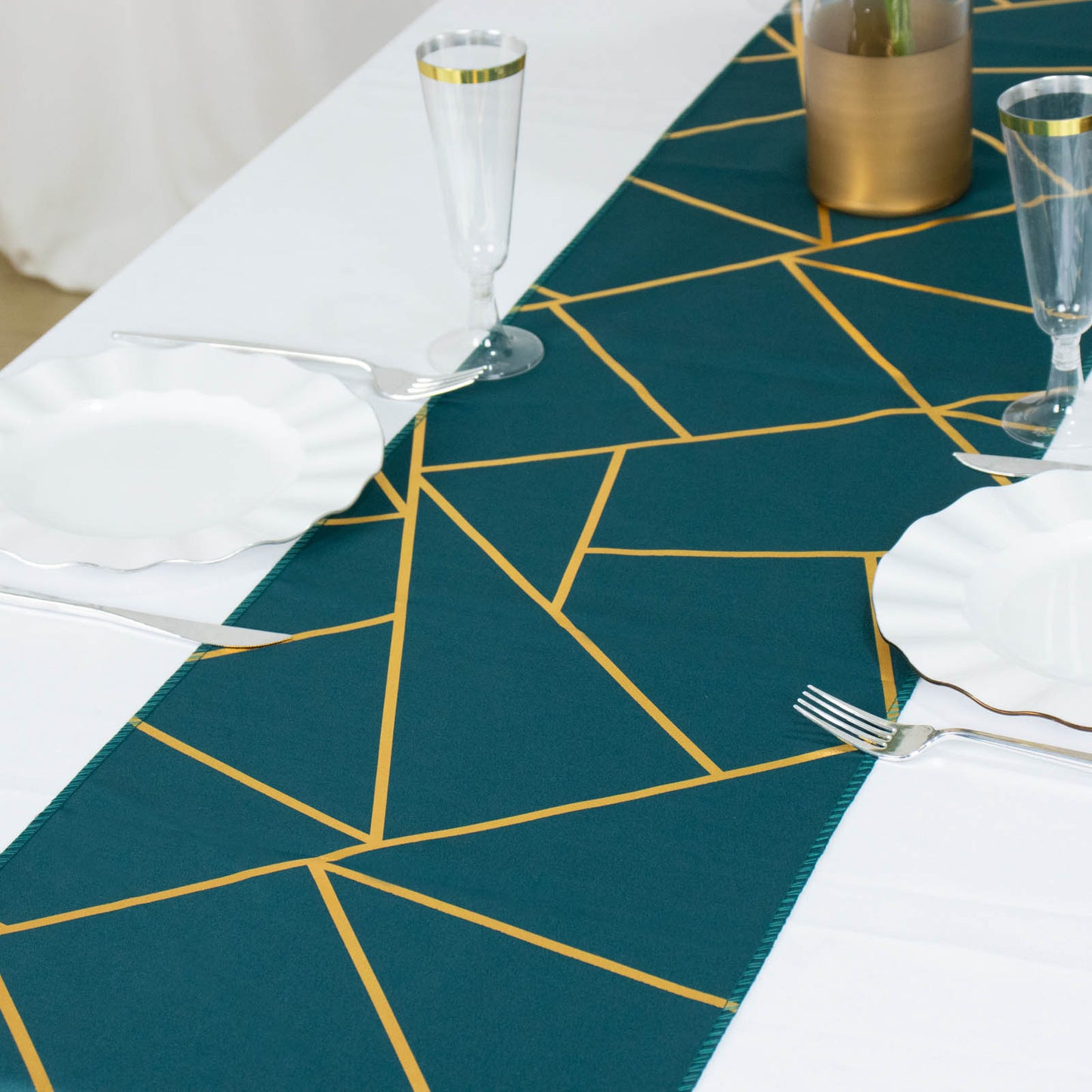 Peacock teal table runner with gold foil geometric pattern.