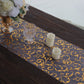 12"x108" Metallic Gold Mesh Table Runner with Embossed Foil Flower Design