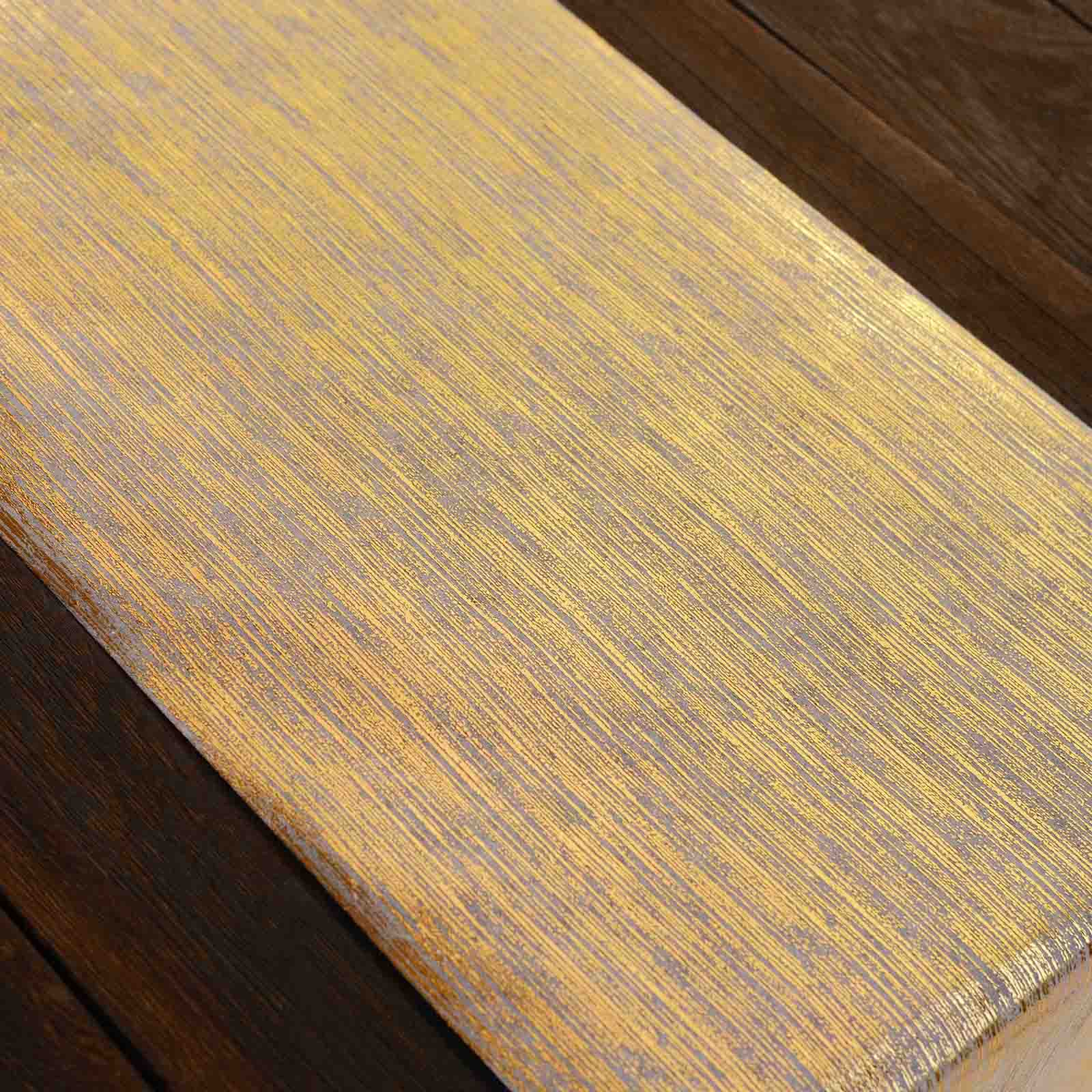 Metallic gold faux suede table runner roll for stylish event decoration.