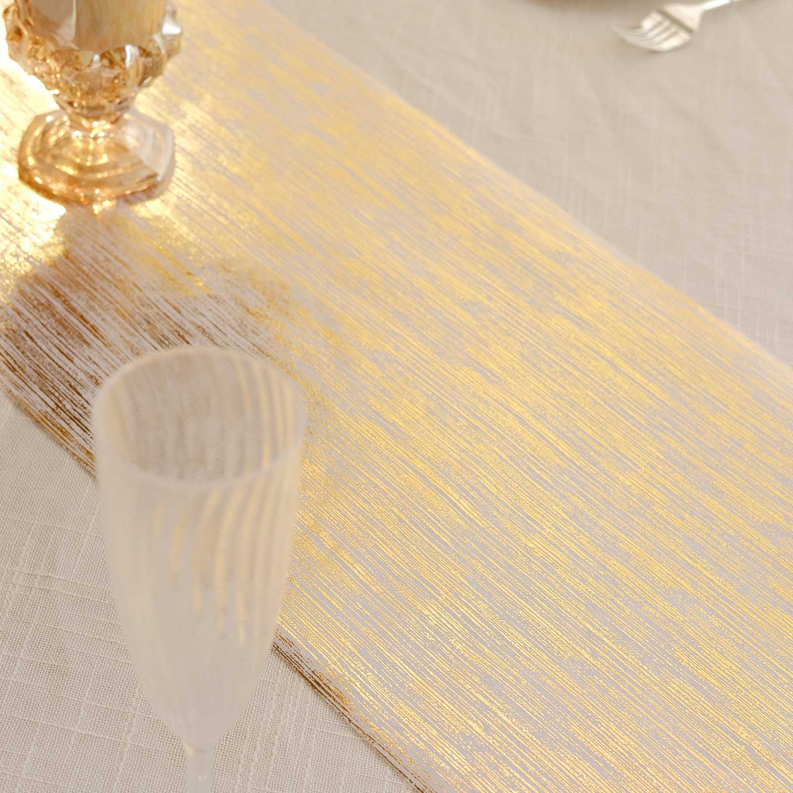 Metallic gold disposable table runner on a stylish event table setting.