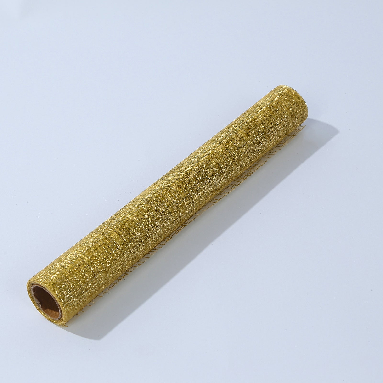 Metallic gold glitter mesh polyester table runner roll.