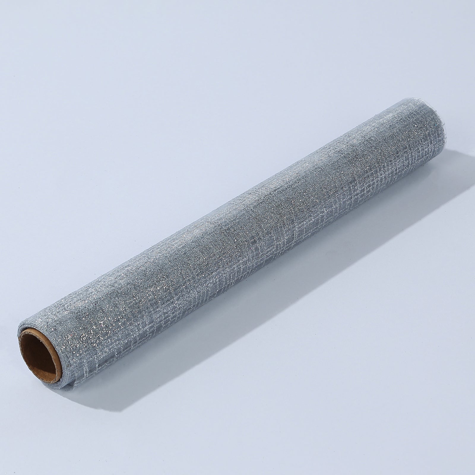 Metallic silver glitter mesh polyester table runner roll.