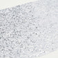 Metallic silver glitter table runner for event decoration.