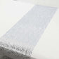 Metallic silver glitter table runner for event decoration.