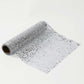 Metallic silver glitter table runner for event decoration.