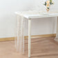 Metallic gold glitter sheer chiffon table runner on a white table.