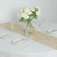 Gold mesh organza disposable table runner with water wave pattern on a table setting.