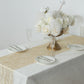 Gold mesh organza table runners with water wave pattern on a table setting.