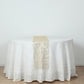 Gold mesh organza disposable table runner with water wave pattern on white table.