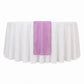 Fuchsia sheer organza table runner on a white table